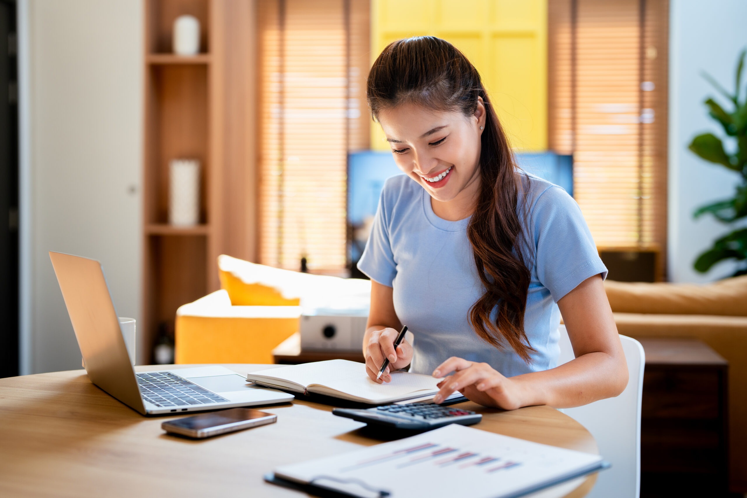 Woman calculating her water bill