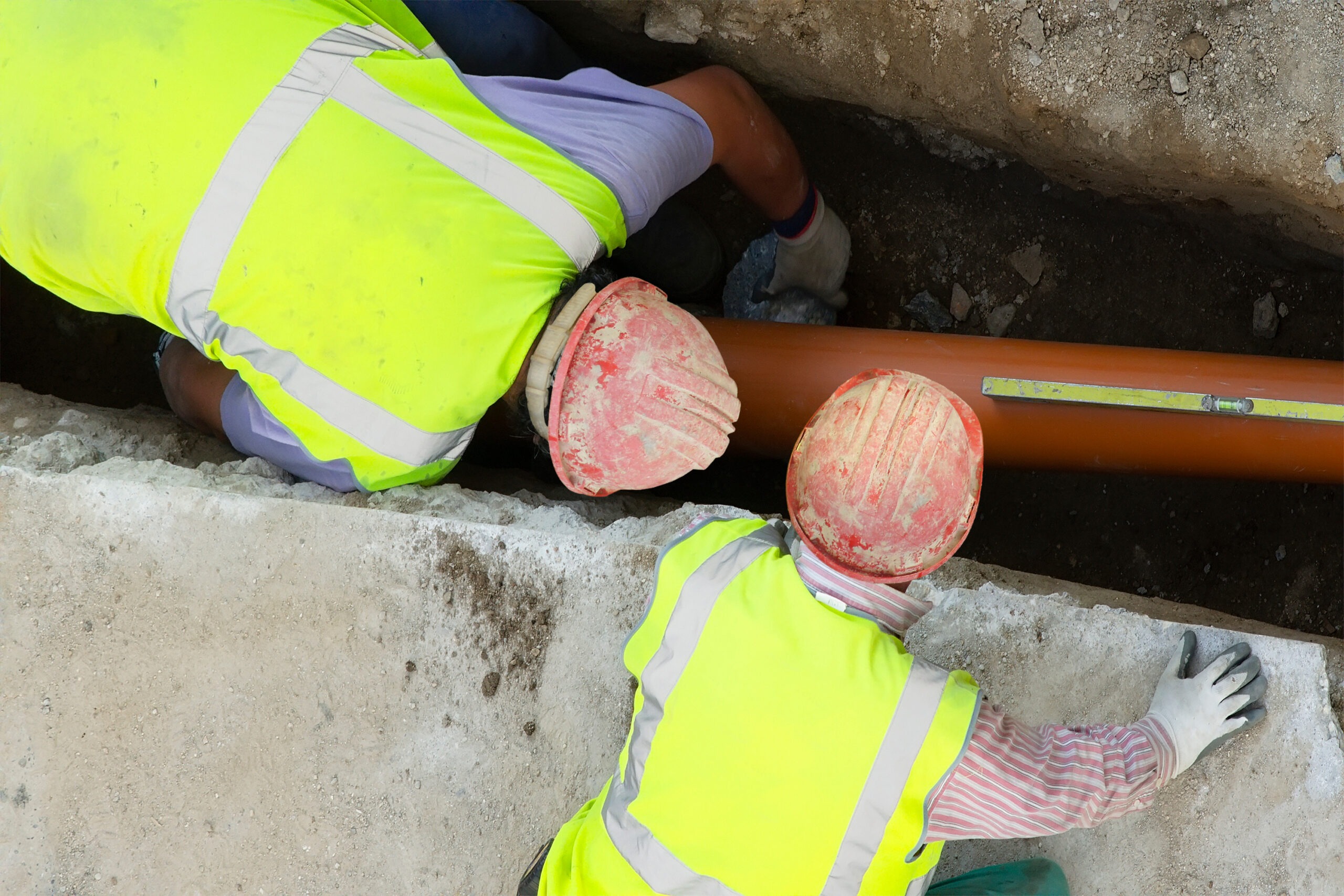 construction workers for repair water and sewer pipes in construction site